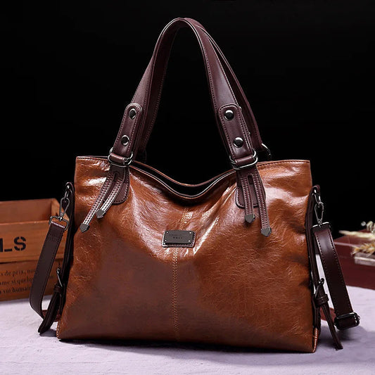 Bolsa de mano de cuero suave refinado Aralyn